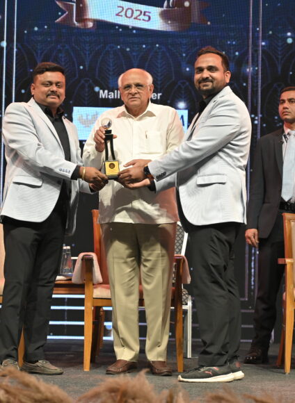 Award presentation for best solar company in gujarat at a ceremony